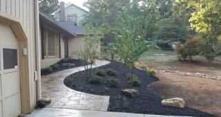 Curved mulch bed flagstone driveway Georgia