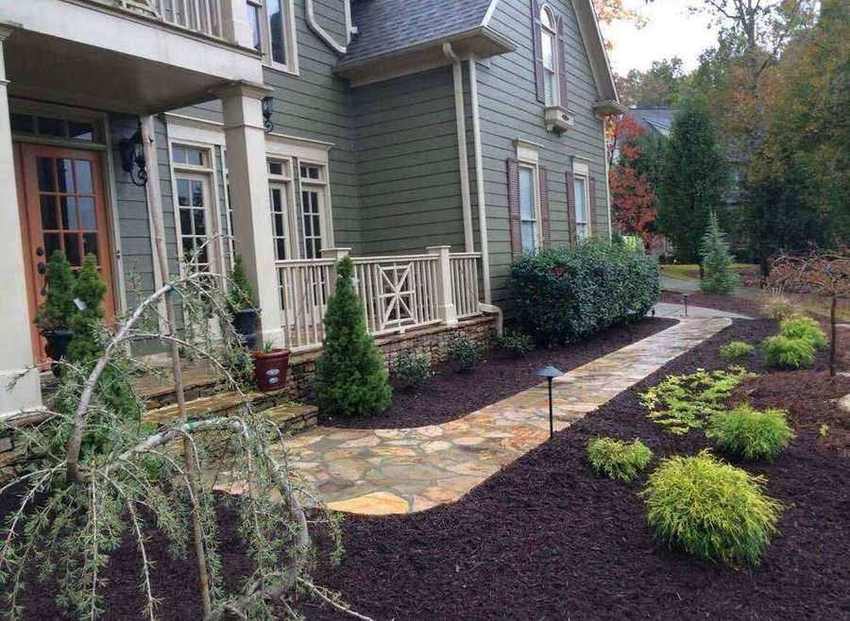 Flagstone walkway with shrubs Georgia